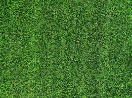 fond de texture d'herbe verte concept de jardin d'herbe utilisé pour faire un terrain de football de fond vert, golf d'herbe, fond texturé de motif de pelouse verte. photo