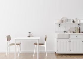 mur blanc vide dans la cuisine moderne. maquette d'intérieur dans un style minimaliste et contemporain. espace libre, copiez l'espace pour votre image, votre texte ou un autre dessin. table, chaises. rendu 3d. photo