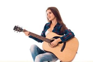 fille sexy avec guitare dans les mains photo