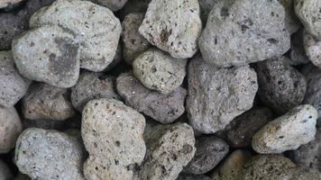 texture de surface détaillée d'un tas de pierre ponce en arrière-plan photo