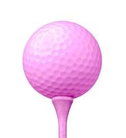 Balle de golf rose et tee isolé sur fond blanc photo