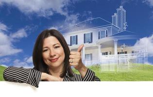 Thumbs up hispanic woman with ghosted house dessin derrière photo