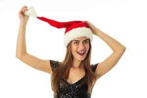 joyeuse jeune fille en bonnet de noel photo