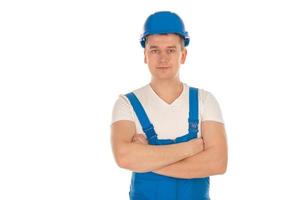 jeune constructeur masculin avec les mains croisées photo