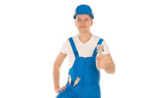 constructeur en uniforme bleu et casque photo