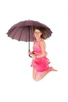 femme avec saut avec parapluie photo