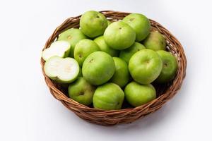 tinda cru, tinde aussi appelé dhemse, gourde de pomme, bébé citrouille, melon rond de courge indienne photo