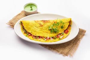 cheela, chilla ou chila est un plat de petit-déjeuner du Rajasthan généralement préparé avec de la farine de pois chiches ou du besan photo