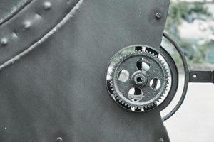 pièces mécaniques en fer et roues dentées. texture steampunk photo