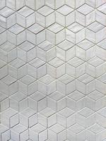 carreaux de mur en mosaïque en céramique de couleur argent brillant dans un design spécial hexagone 3d, forme rectangulaire, géométrique, texture, toile de fond, arrière-plan abstrait, illustration de conception photo