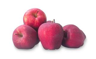 fruits frais de grosse pomme rouge en pile, en tas ou en tas isolés sur fond blanc photo