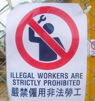 signe de travailleurs illégaux photo