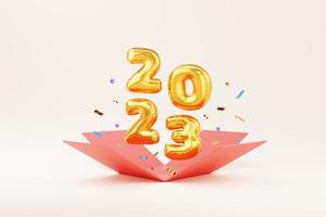 Les numéros de ballon doré 3d du nouvel an 2023 apparaissent dans une boîte cadeau avec des confettis. Illustration 3D. concept de célébration du nouvel an photo