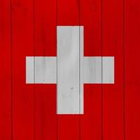 drapeau suisse sur un fond texturé. collage conceptuel. photo