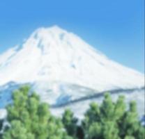 vue brouillée des branches de cèdre vert contre le volcan et le ciel bleu photo