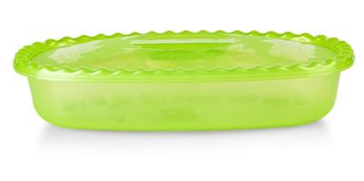bol en plastique vert avec couvercle isolé sur blanc photo