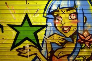 la texture du mur, décorée en graffiti dessinant l'image d'une jolie fille aux cheveux bleus photo