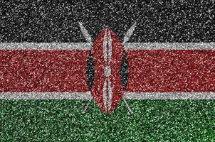 drapeau du kenya représenté sur de nombreuses petites paillettes brillantes. fond de festival coloré pour la fête photo