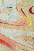 peintures abstraites de graffitis sur le mur de béton. texture de fond photo