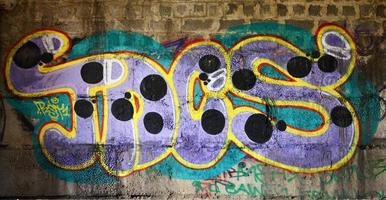 image détaillée du dessin de graffiti couleur. image d'art de rue de fond photo
