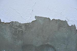 fond de mur de ciment avec peinture écaillée photo