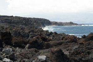 village lajido île de pico açores maisons de lave noire fenêtres rouges photo