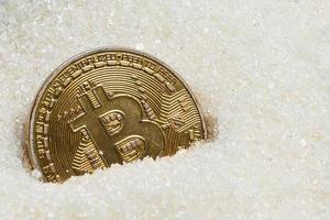 pièce physique bitcoin avec du sucre photo