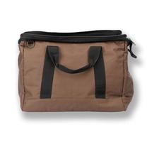 sac de voyage textile marron ouvert avec anses photo