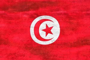 Illustration 3d d'un drapeau tunisien - drapeau en tissu ondulant réaliste photo