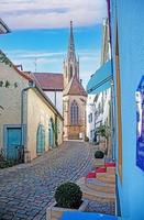 image d'une scène typique d'une ville historique allemande avec des rues pavées et une église photo