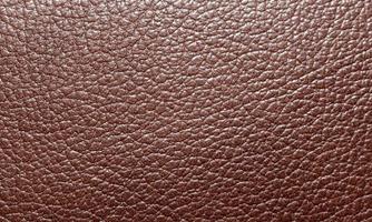 La texture de la surface en cuir rouge gros plan macro photo