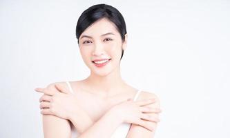 image de beauté de jeune femme asiatique avec une belle peau photo