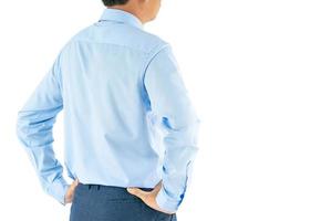 homme en chemise à manches longues porter debout avec akimbo with clipping path photo