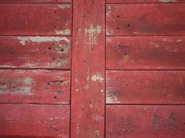 vieux mur en bois peint en rouge. texture de fond. photo