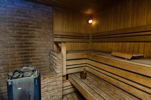 cabine de sauna avec accessoires de sauna traditionnels photo