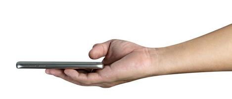 main tenant un téléphone intelligent mobile isolé sur fond blanc, chemin de détourage photo