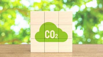 l'icône co2 sur le cube en bois pour le rendu 3d du concept environnemental photo