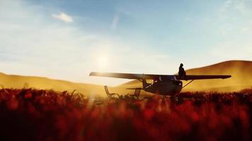 silhouette femme assise sur une aile d'avion, rendu 3d. photo