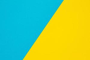 couleur de papier pastel bleu et jaune pour le fond - couleur du drapeau ukrainien photo
