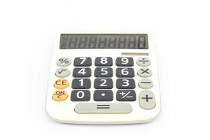 calculatrice sur fond blanc photo