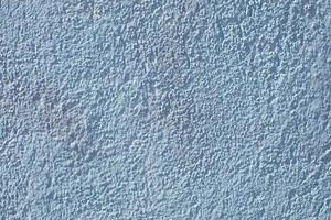 Texture de mur propre en stuc bleu photo