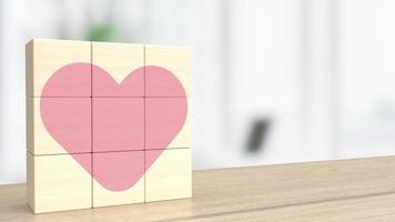 le cube en bois et le coeur rose pour la saint-valentin ou l'amour concept 3d photo