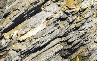 belle plage de modèle de texture de rocher de pierre de falaise de roche au mexique.
