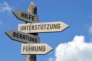 aide, soutien, conseils, orientation en allemand - panneau en bois photo