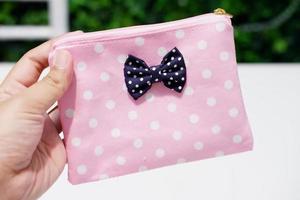 belle et mignonne pochette pour faire du shopping photo