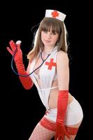 jeune infirmière sexy avec un stéthoscope. isolé photo