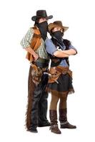 couple de cambrioleurs en costumes de cow-boy photo