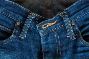 jeans denim bleu homme, arrière-plan avant zip ouvert, couleur vintage du jean denim vintage photo