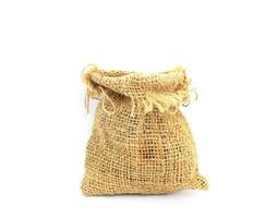 sac de jute sur fond blanc photo