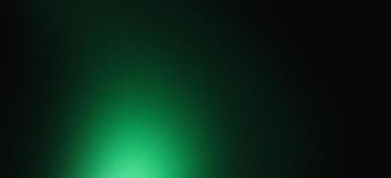 fond granuleux dégradé de couleur vert foncé, point lumineux sur noir, effet de texture de bruit, taille de bannière large photo